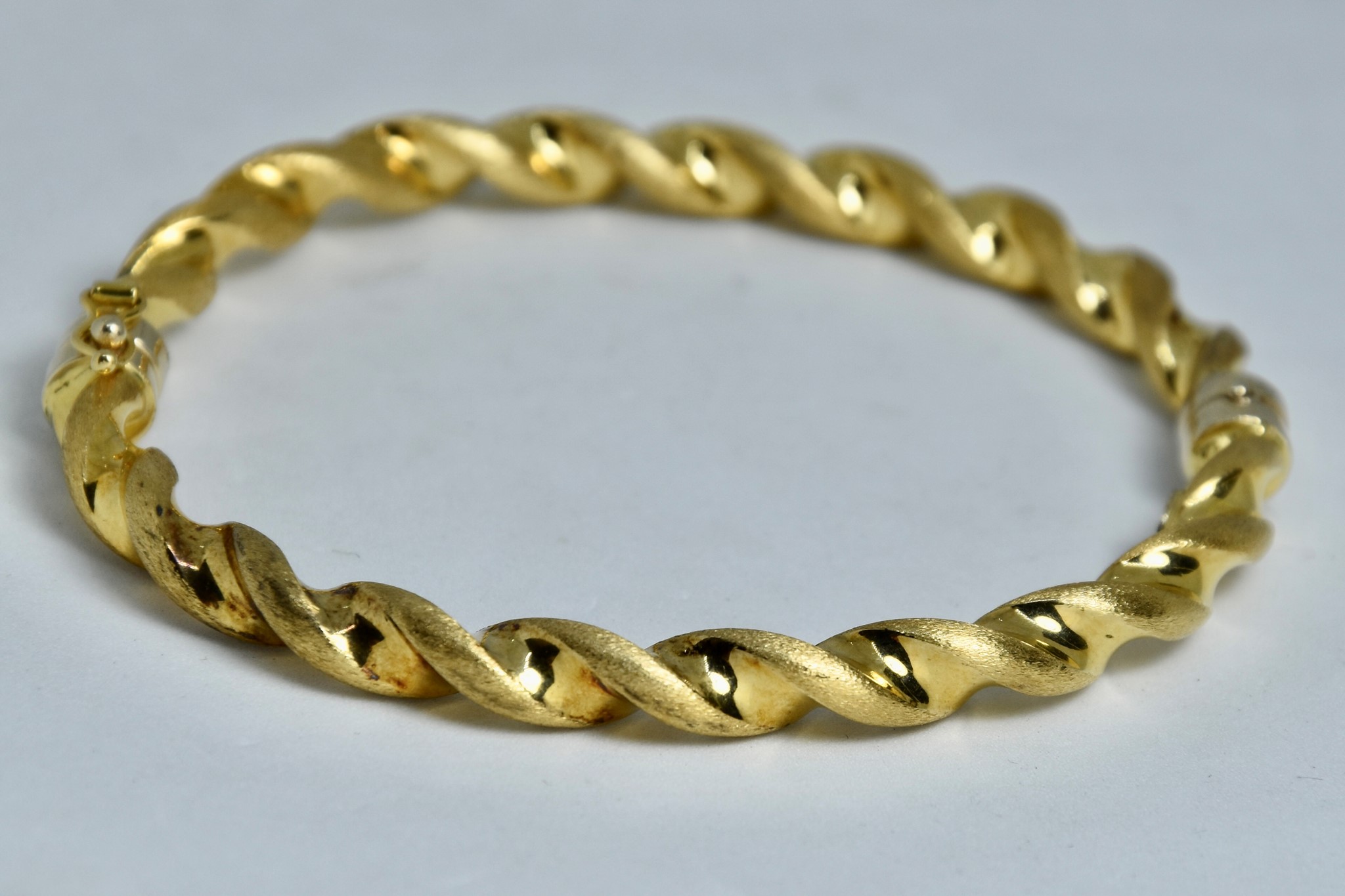 Immagine di BRACCIALE RIGIDO INTRECCIATO